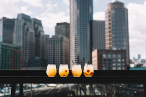 Four drinks on a balcony